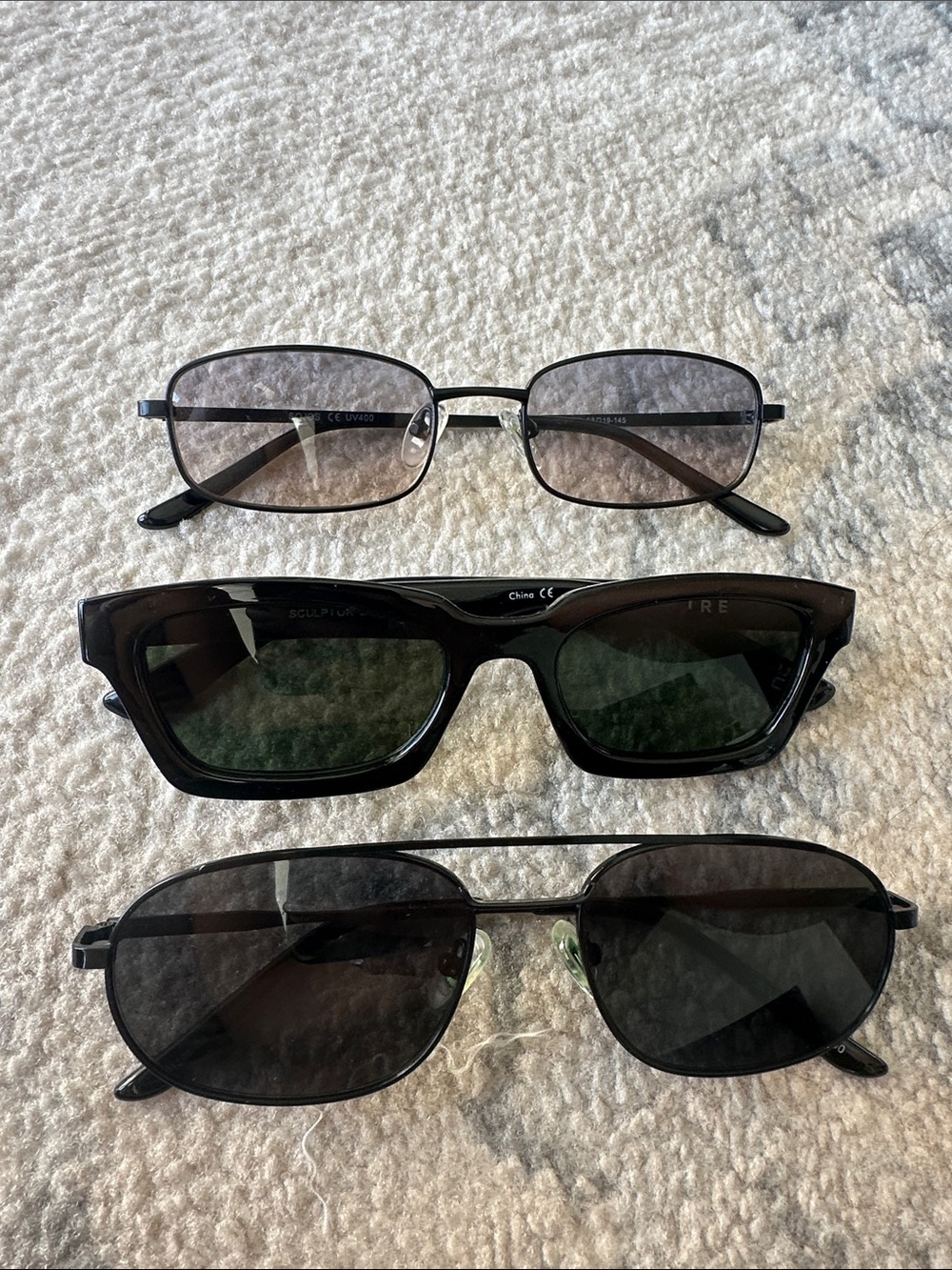 Three pairs of fashion sunglasses